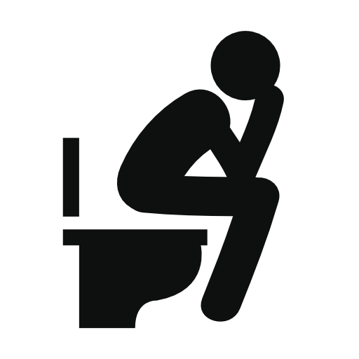Man sitting in the bathroom