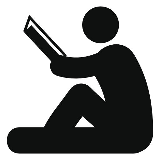 Side view of sitting man reading