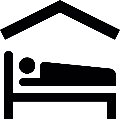 Person lying on bed inside a home