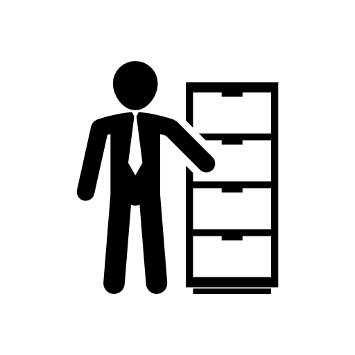 Businessman standing beside a drawer