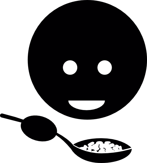 Child eating food with a spoon