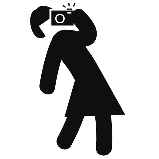 Woman with a camera taking a photo