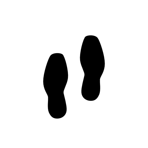 Footprints couple of human shoes in solid black shape
