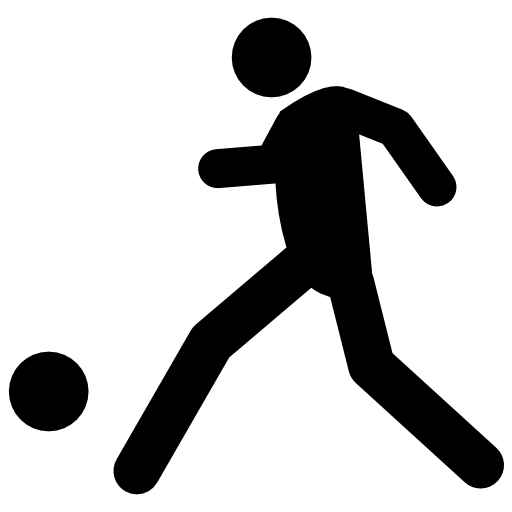 Football player kicking ball