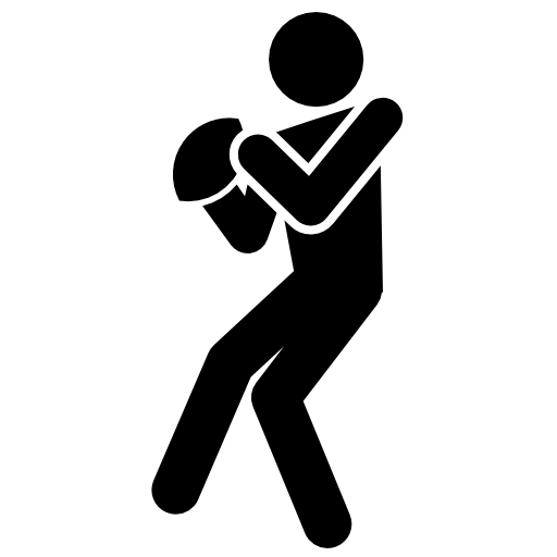 Rugby player silhouette with the ball in hands
