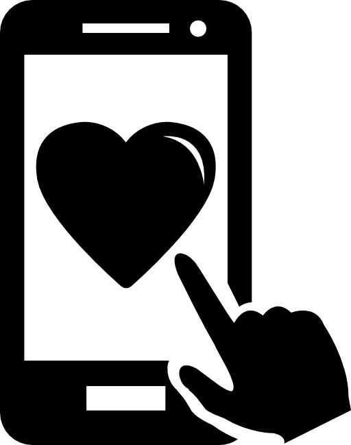 Heart shape in a tablet monitor and a hand pointing it