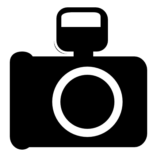 Photo camera with flash on top