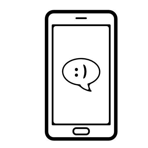 Speech bubble chat message with a smile symbol on phone screen