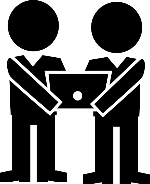 Two males holding a computer