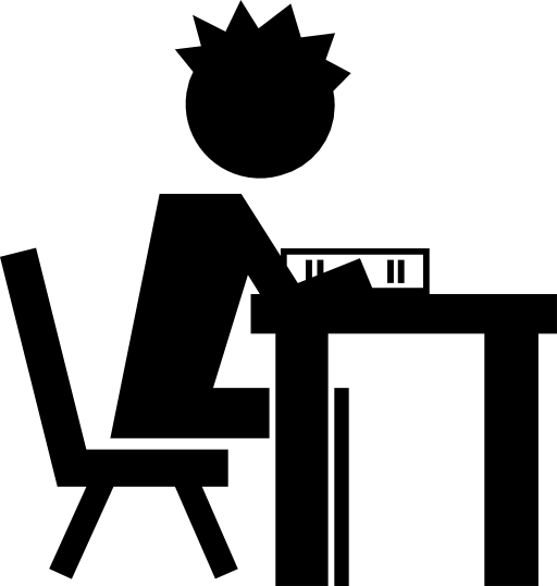 Student reading educational book sitting on a chair with desk from side view