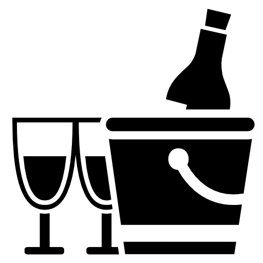 Wine bottle in bucket with two wine glasses