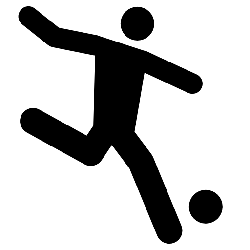 Football player running behind the ball