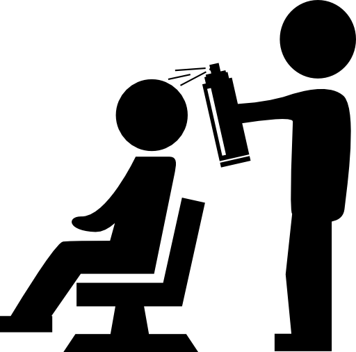 Hairdresser with spray bottle behind the client of hair salon