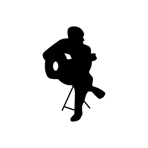 Flamenco guitar player sitting silhouette