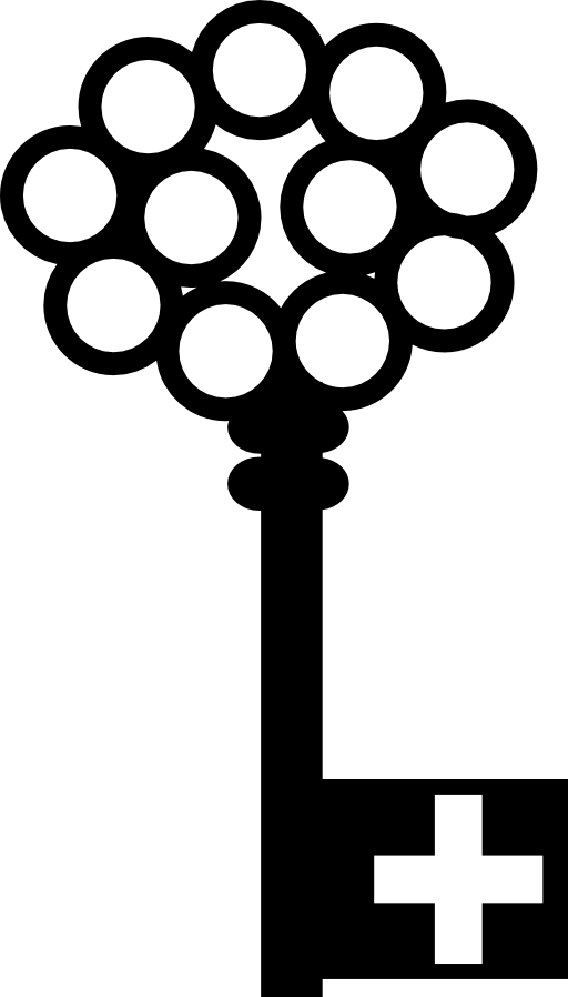 Key with a cross hole and circles on top