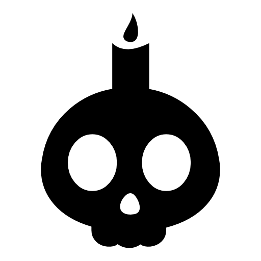 Halloween skull with a burning candle on it