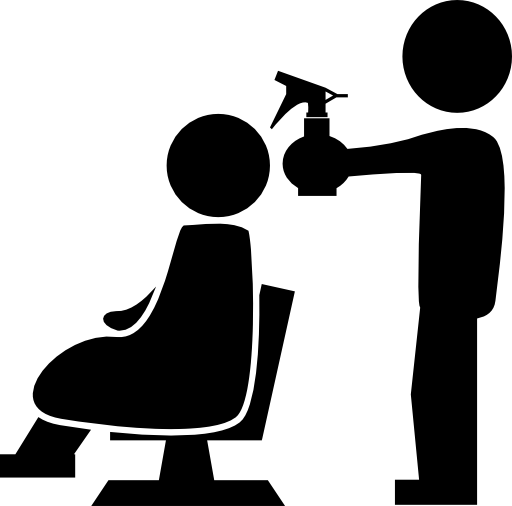 Hairdresser with spray bottle behind the client of the salon
