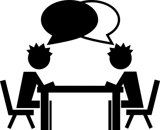Students talking on a table