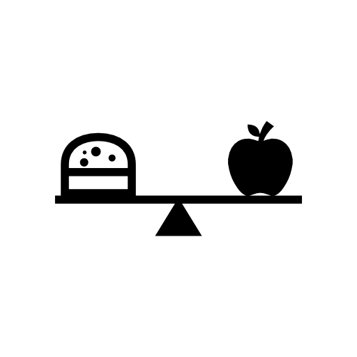 Burger and apple on a balancing scale